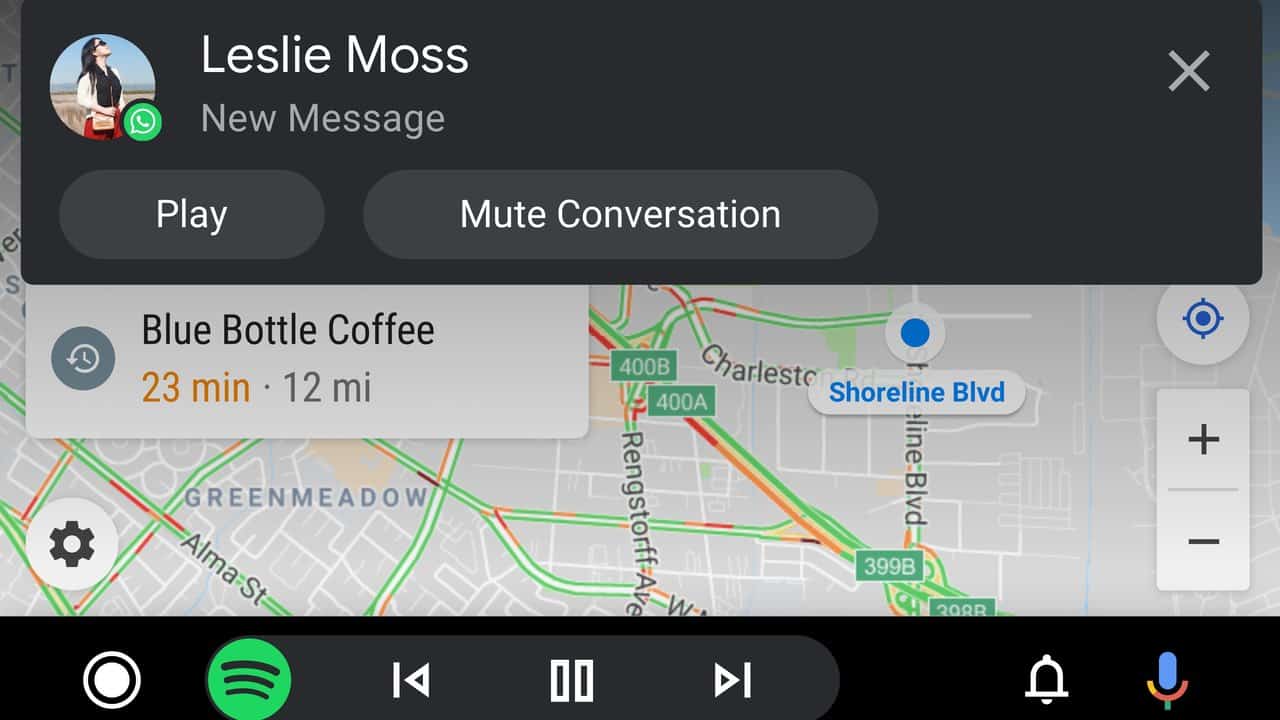 Android Auto interface showing an incoming message card with Play and Mute buttons over a Google Maps view, with a media bar along the bottom